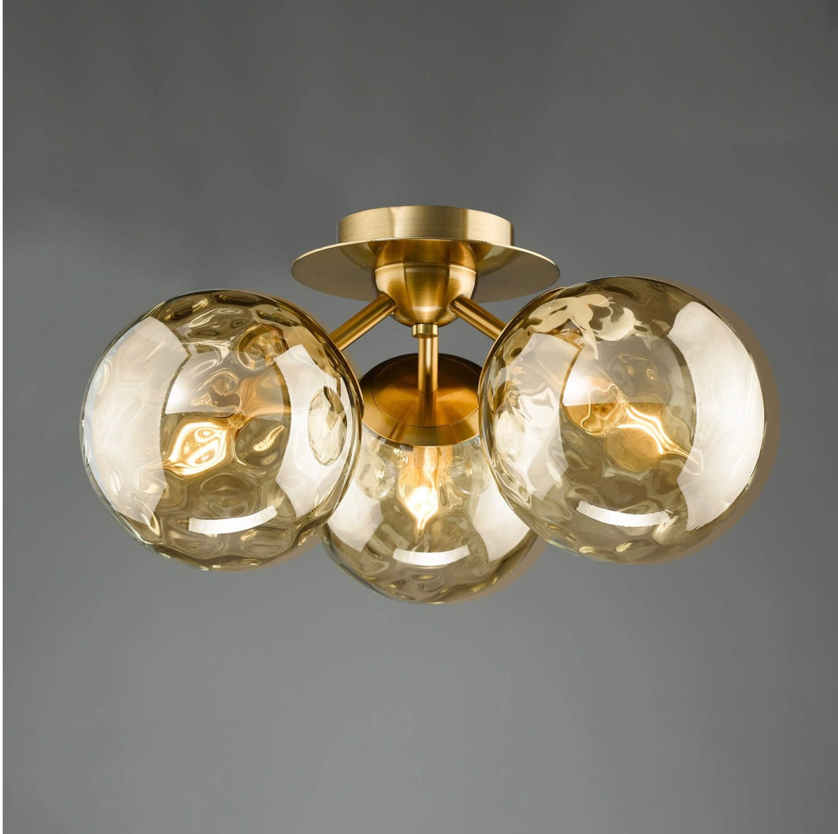 Ulrika 3 Light Flush Antique Brass and Amber Glass