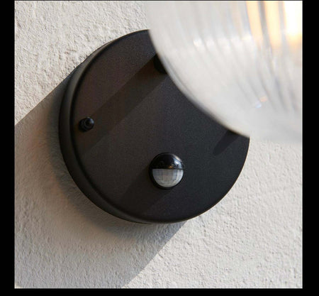 Eldon outdoor Wall PIR sensor light / exterior black and ribbed glass lamp