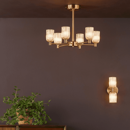 Hilaria 2 Light Bathroom Wall Light Antique Gold and Amber Ribbed Glass IP44