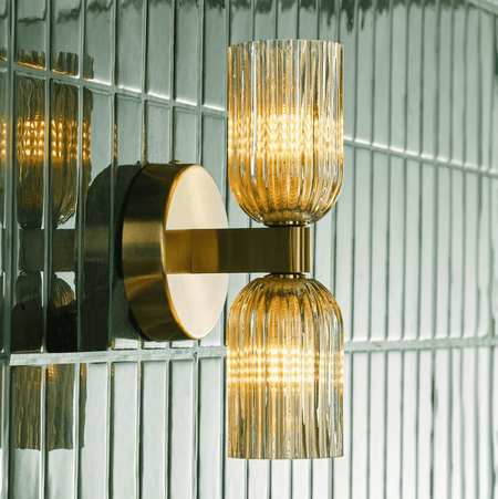 Hilaria 2 Light Bathroom Wall Light Antique Gold and Amber Ribbed Glass IP44